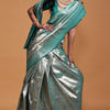 Demure Sea Green Kanjivaram Silk Saree With Ornate Blouse Piece