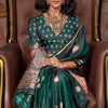 Fairytale Dark Green Banarasi Satin Silk Saree With Angelic Blouse