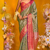 Gratifying Dark Green Kanjivaram Silk Saree With Vibrant Blouse Piece