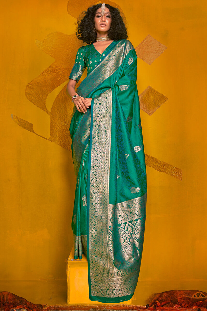 Eloquence Dark Green Soft Banarasi Silk Saree With Propinquity Blouse Piece
