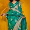 Eloquence Dark Green Soft Banarasi Silk Saree With Propinquity Blouse Piece
