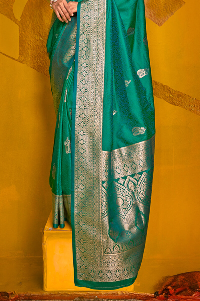 Eloquence Dark Green Soft Banarasi Silk Saree With Propinquity Blouse Piece