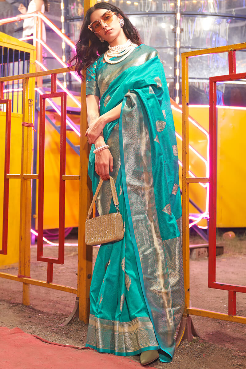 Prominent Turquoise Soft Banarasi Silk Saree With Desirable Blouse Piece
