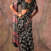 Comely Black Ajrakh Printed Satin Silk Saree With Demanding Blouse Piece