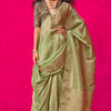 Resonant Green Soft Banarasi Tissue Silk Saree With Beauteous Blouse Piece