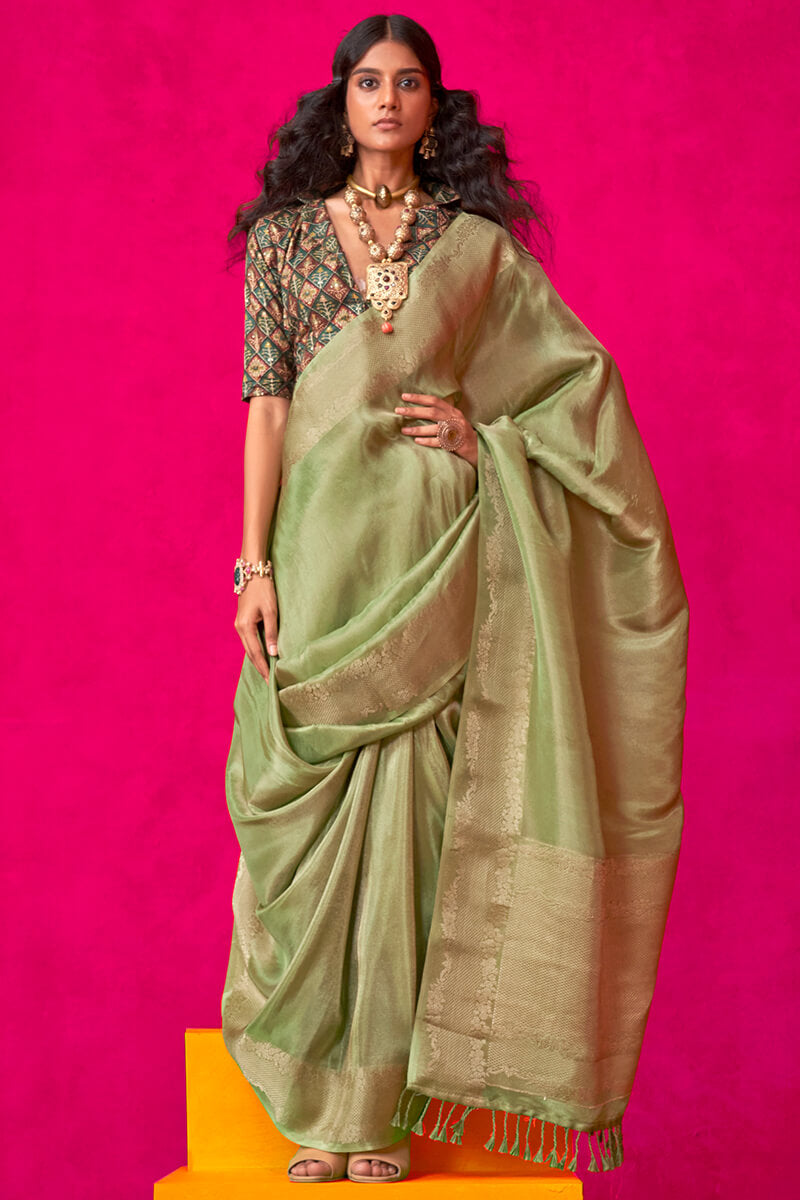 Resonant Green Soft Banarasi Tissue Silk Saree With Beauteous Blouse Piece
