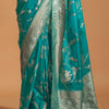 Chatoyant Turquoise Georgette Banarasi Silk Saree With Evanescent Blouse Piece