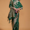 Exuberant Dark Green Georgette Banarasi Silk Saree With Piquant Blouse Piece