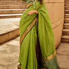 Ornate Green Patola Silk Saree with Tremendous Blouse Piece