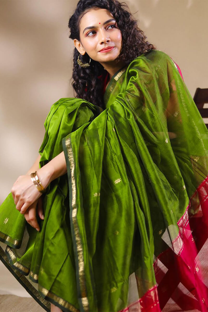 Opulent Green Cotton Silk Saree With Demanding Blouse Piece