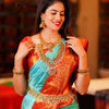 Blissful Turquoise Soft Silk Saree with Ethnic Blouse Piece