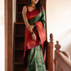 Extraordinary Dark Green Soft Silk Saree With Adorning Blouse Piece
