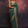 Radiant Dark Green Soft Silk Saree With Exquisite Blouse Piece