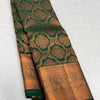Intricate Dark Green Soft Silk Saree With Glorious Blouse Piece