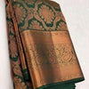 Intricate Dark Green Soft Silk Saree With Glorious Blouse Piece