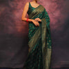 Adorning Dark Green Soft Silk Saree With Prominent Blouse Piece