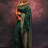 Adorning Dark Green Soft Silk Saree With Prominent Blouse Piece