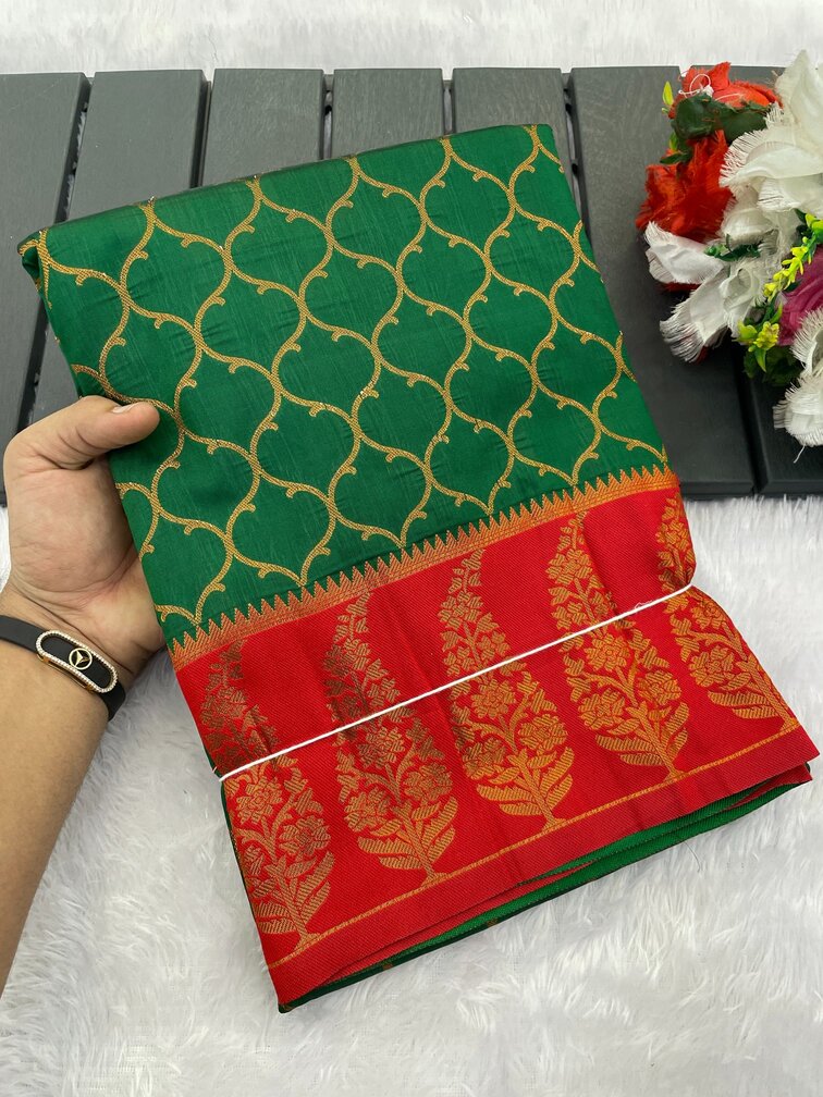 Lovely Dark Green Soft Banarasi Silk Saree With Unique Blouse Piece