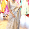 Bollywood Style Silver Soft Tissue Silk Saree With Winsome Blouse Piece