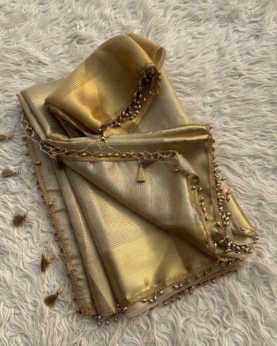 Fancifull Golden Soft Tissue Silk Saree With Demesne Blouse Piece