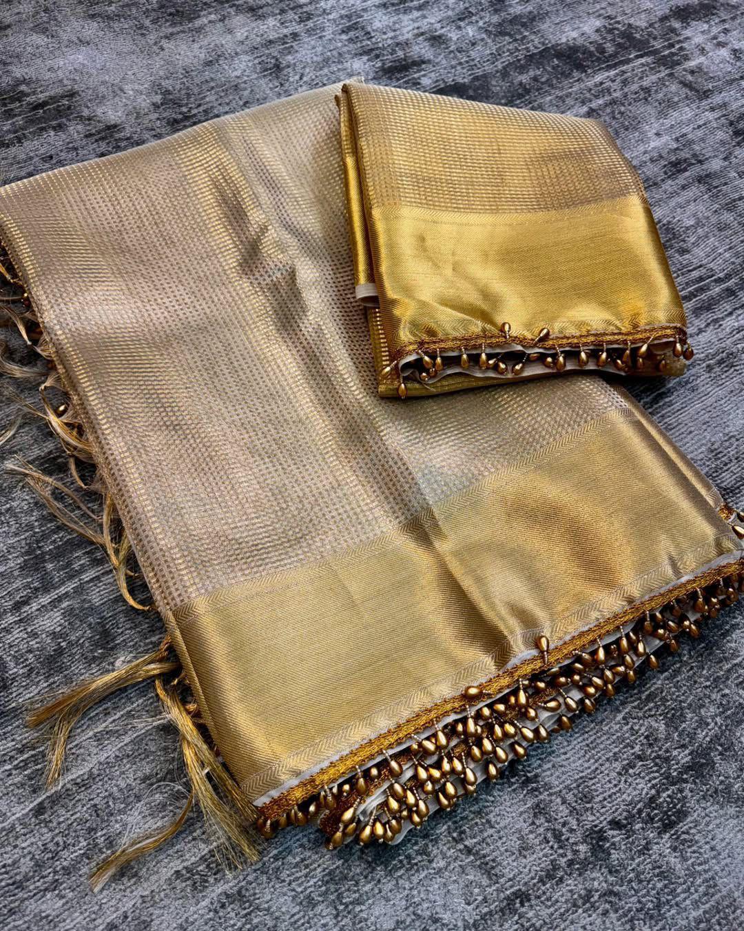 Fancifull Golden Soft Tissue Silk Saree With Demesne Blouse Piece