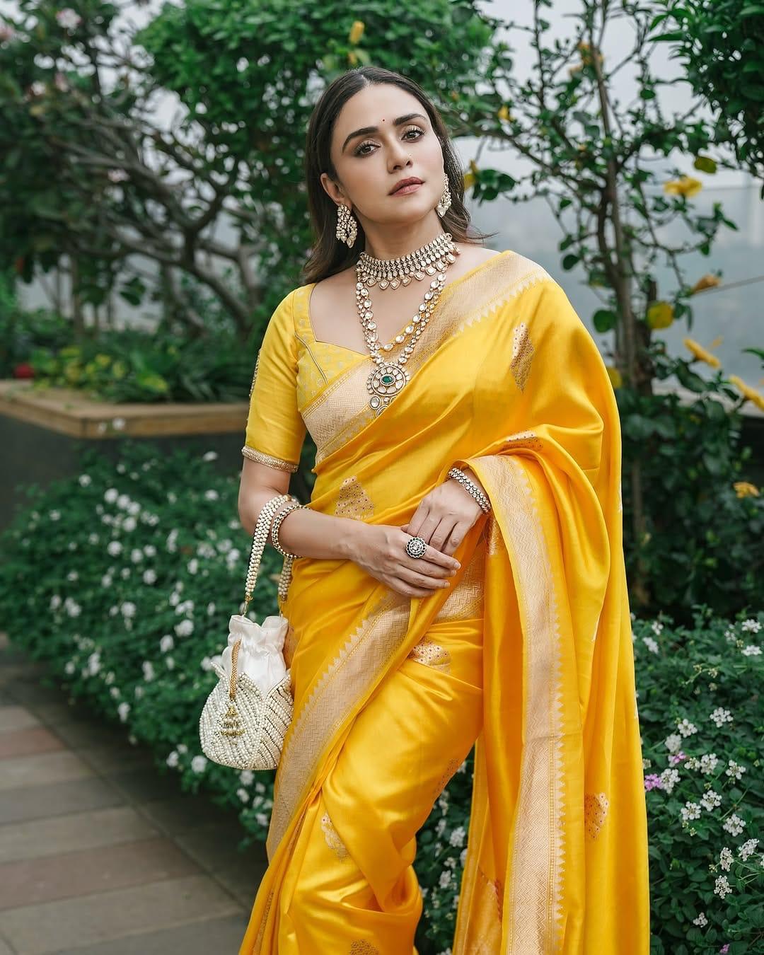 Enchanting Yellow Soft Silk Saree With Flamboyant Blouse Piece
