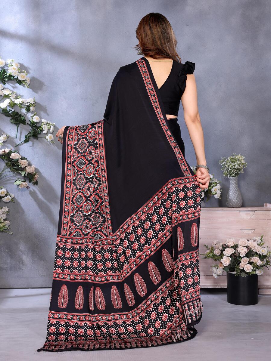Supernal Black Ajrak Printed Soft Silk Saree With Piquant Blouse Piece