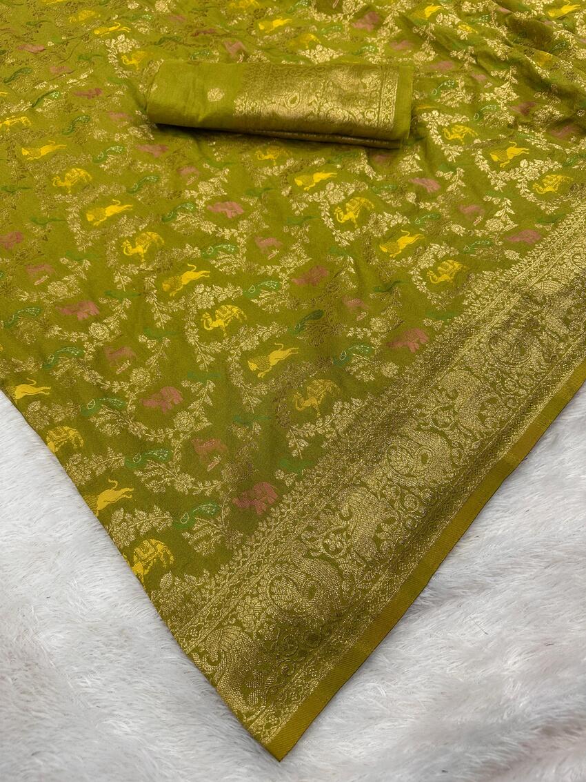Cynosure Green Soft Banarasi Silk Saree With Precious Blouse Piece