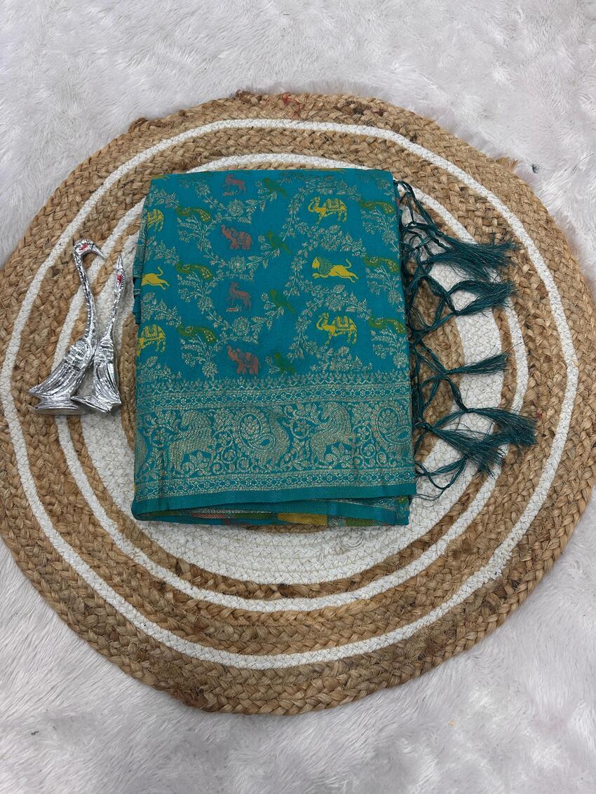 Demanding Sea Green Soft Banarasi Silk Saree With Radiant Blouse Piece