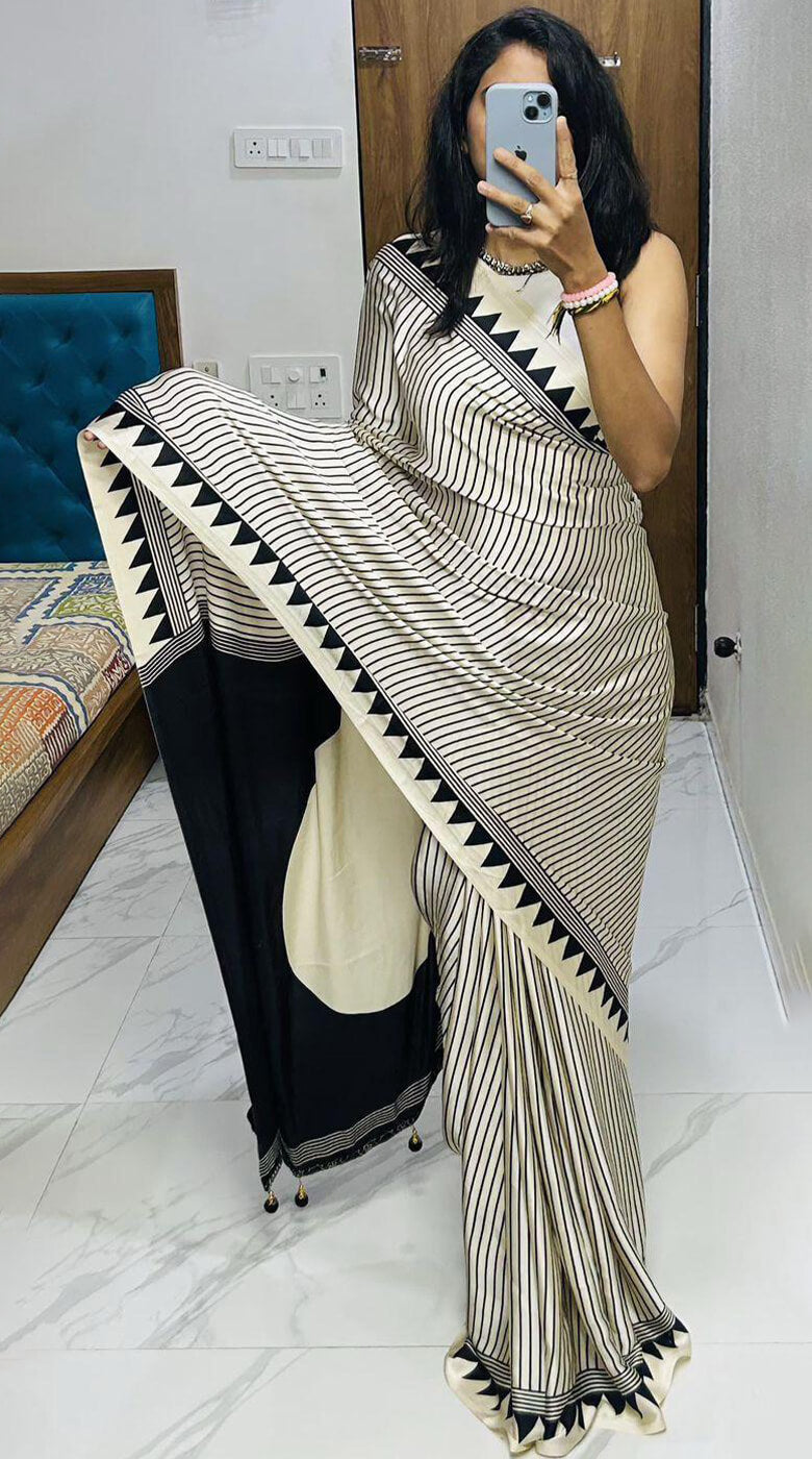Enamoring Beige Digital Printed Crape Silk Saree With Gossamer Blouse Piece