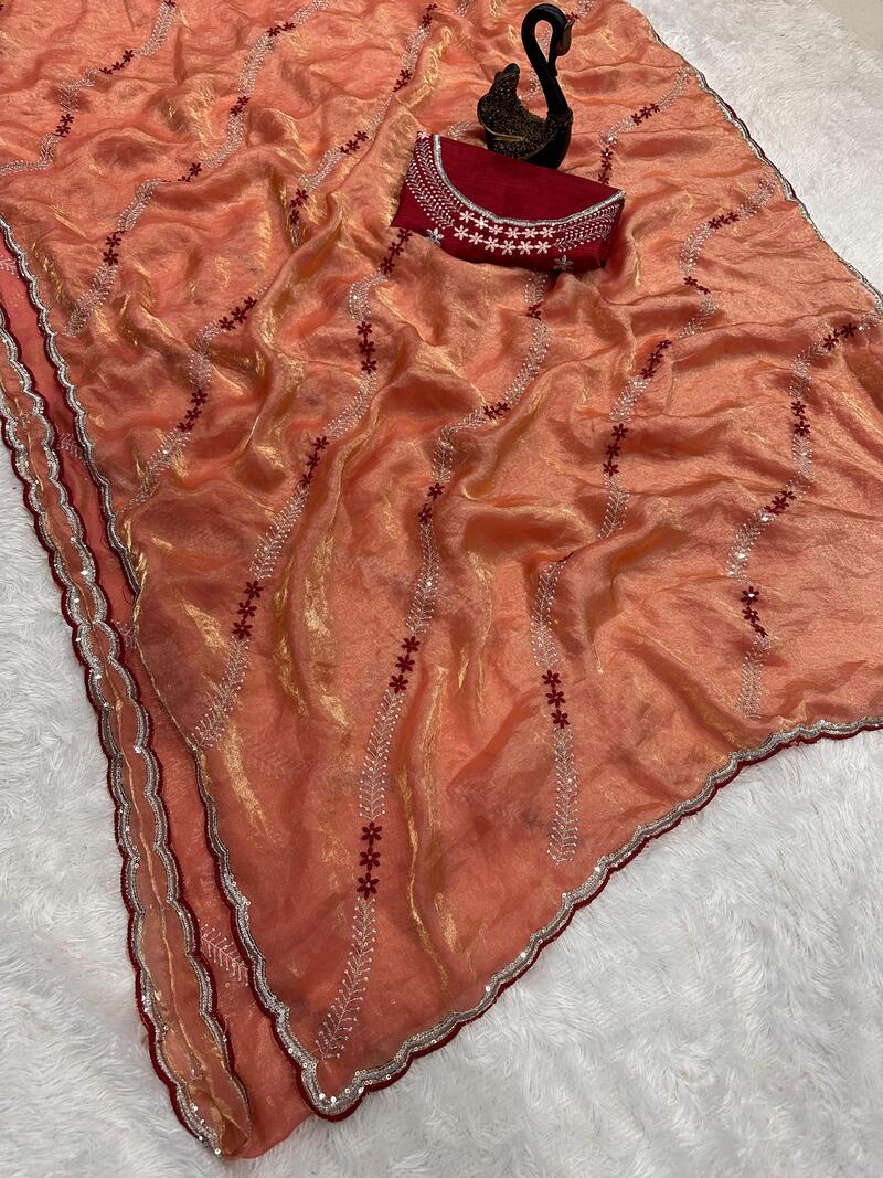 Embrocation Orange Sequence Work Fandy Silk Saree With Gratifying Blouse Piece