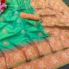 Eloquence Green Soft Banarasi Silk Saree With Whimsical Blouse Piece