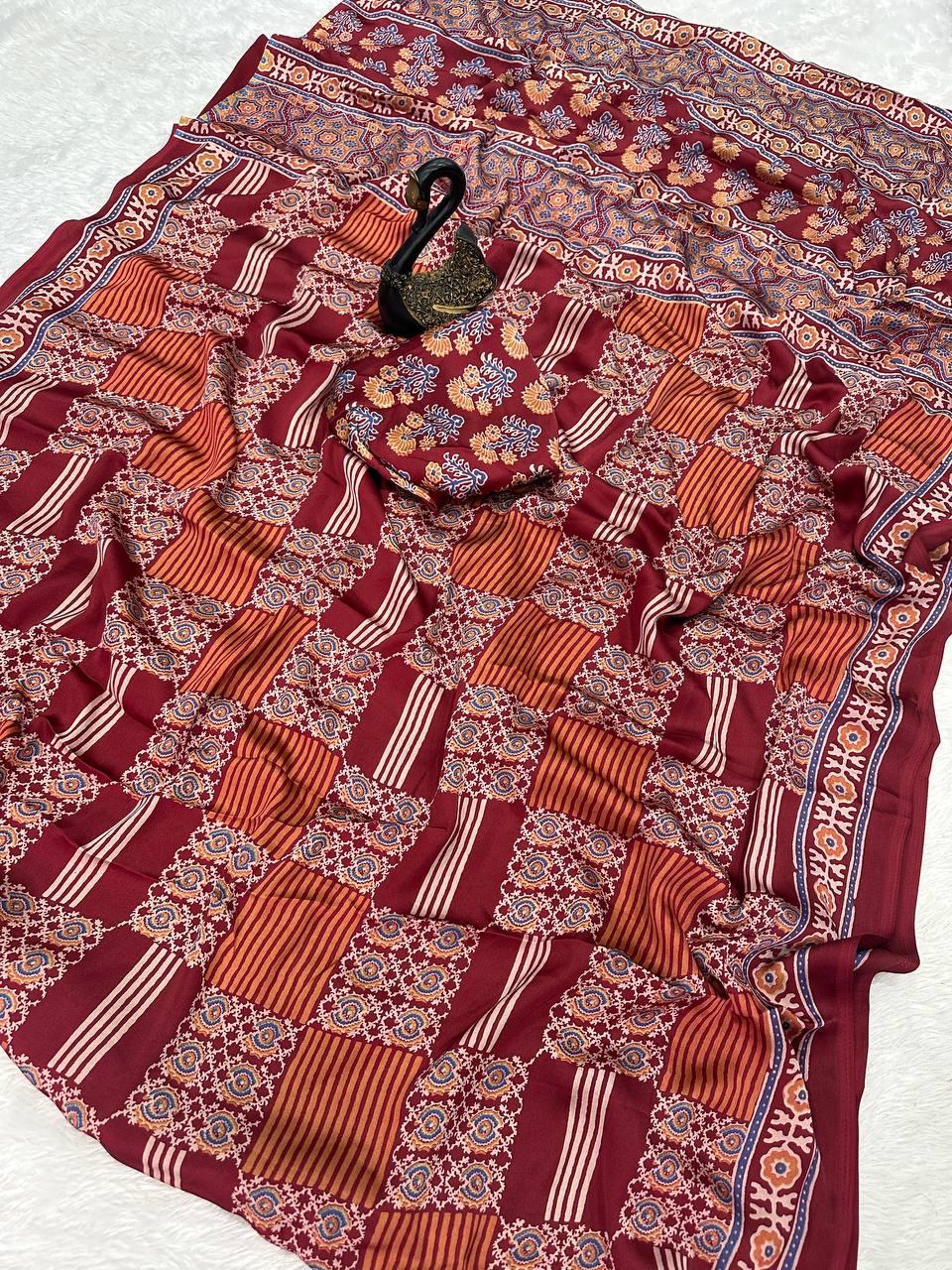 Glamorous Maroon Ajrakh Printed Gajji Soft Silk Saree With Assemblage Blouse Piece
