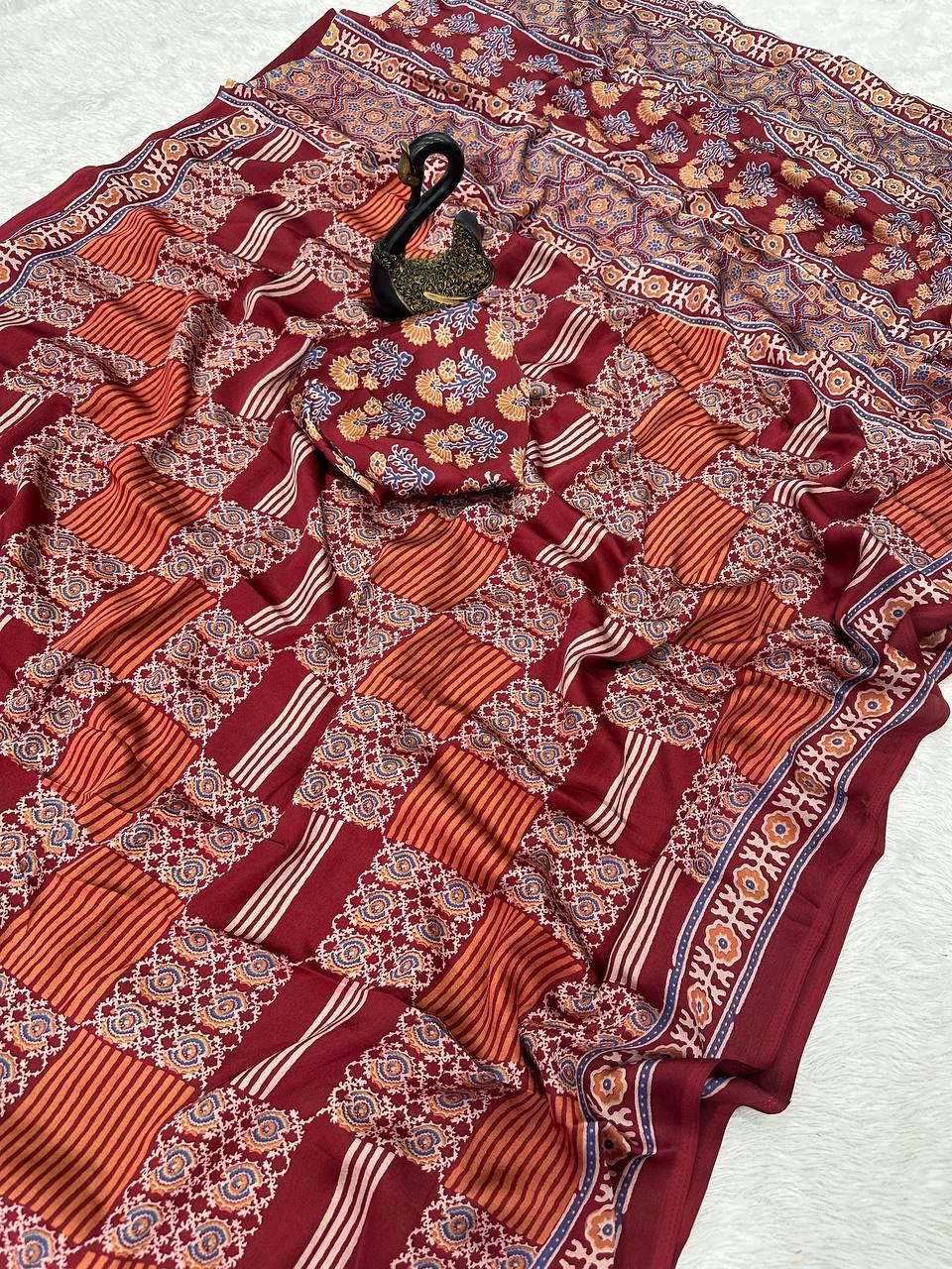 Glamorous Maroon Ajrakh Printed Gajji Soft Silk Saree With Assemblage Blouse Piece