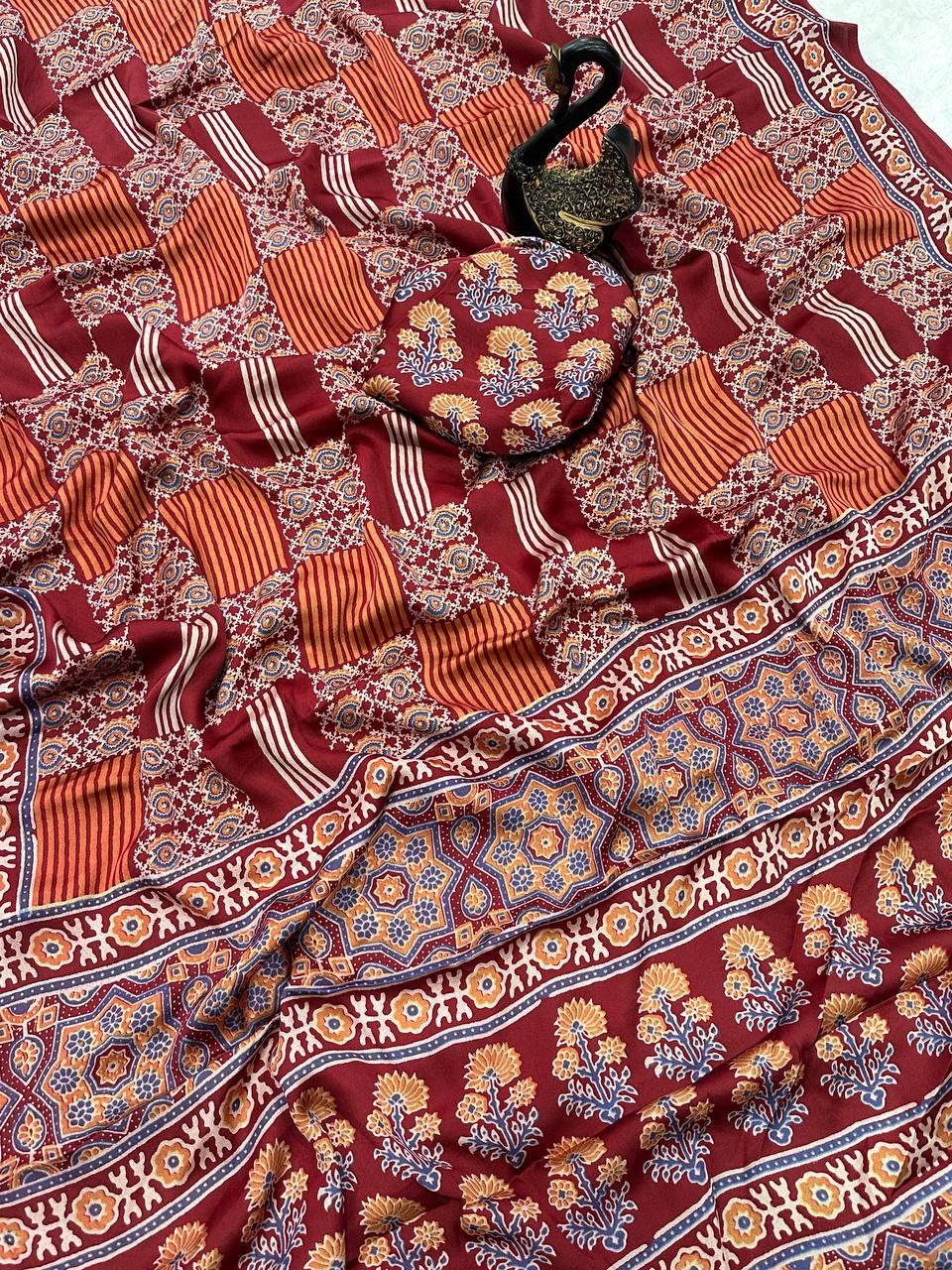 Glamorous Maroon Ajrakh Printed Gajji Soft Silk Saree With Assemblage Blouse Piece