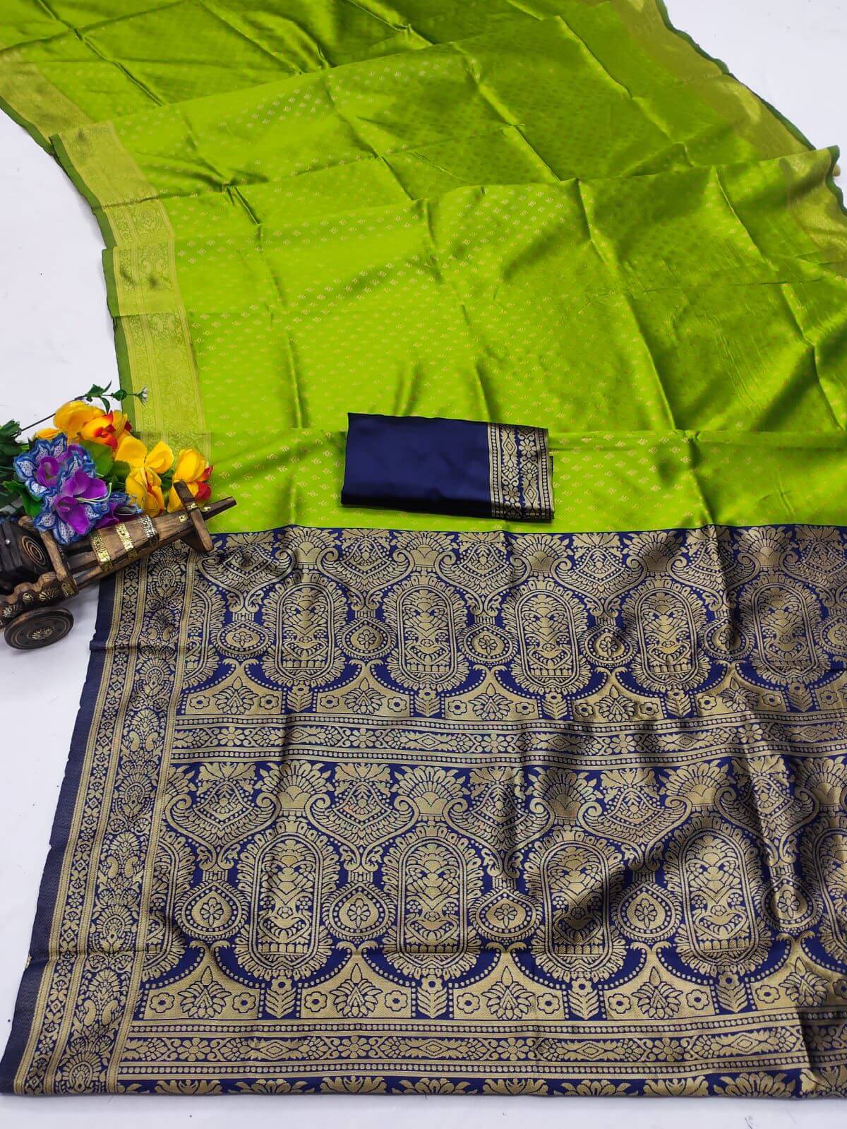 Radiant Parrot Soft Silk Saree With Jazzy Blouse Piece
