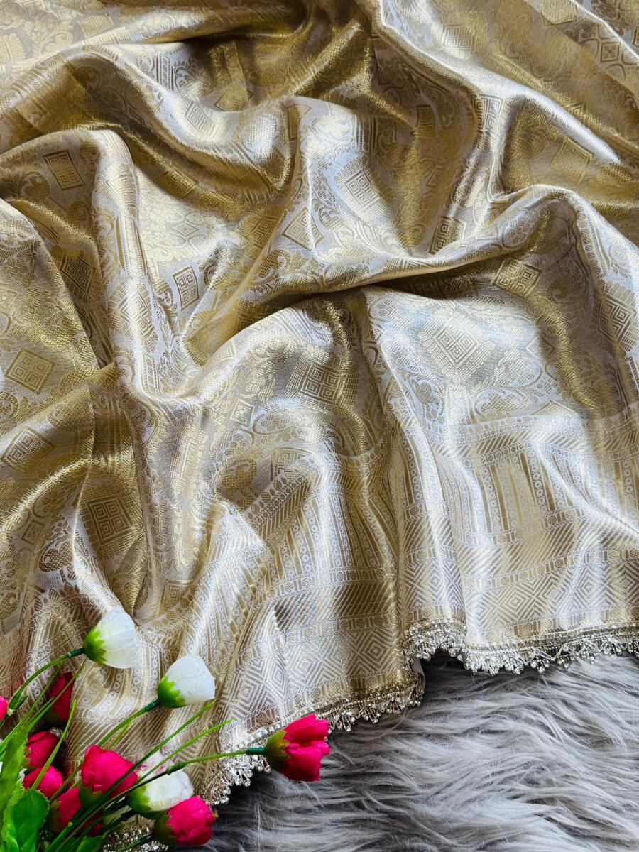 Fancifull Beige Soft Tissue Silk Saree With Classy Blouse Piece