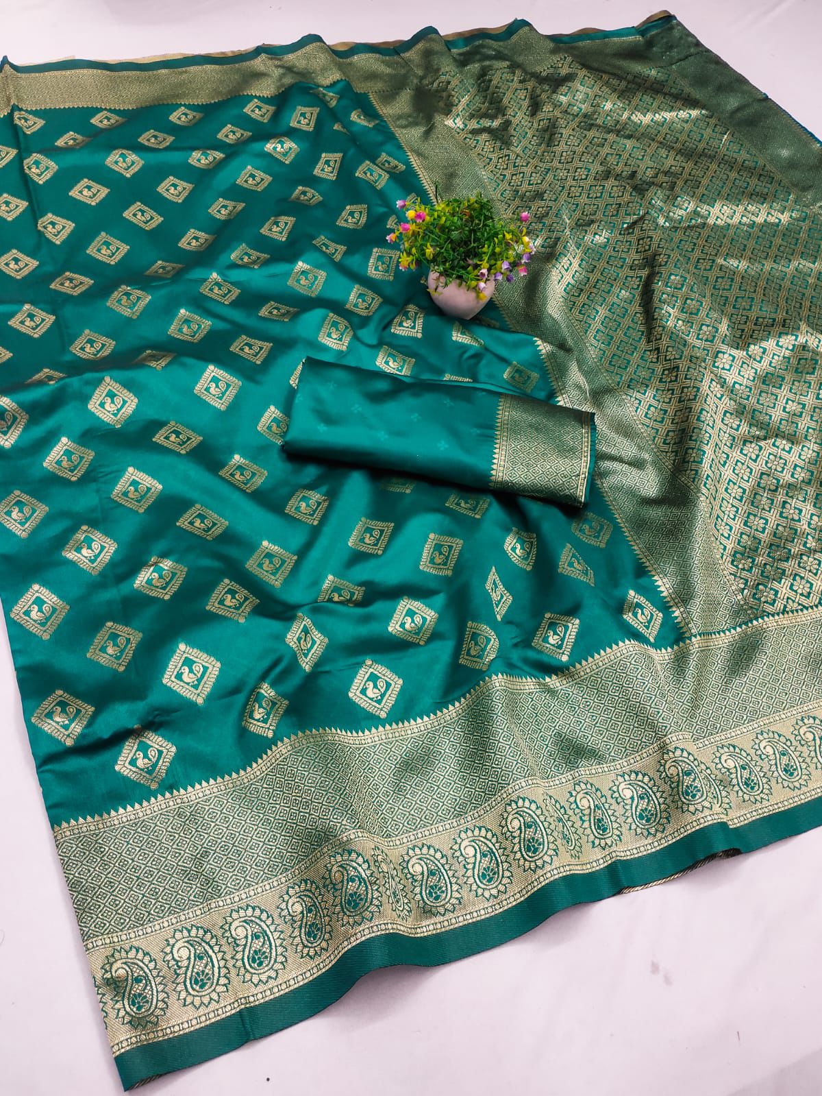 Symmetrical Rama Soft Silk Saree With Elegant Blouse Piece