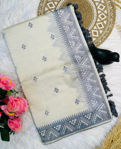 Cynosure Off White Embroidery Work Tussar Silk Saree With Smart Blouse Piece