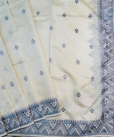 Cynosure Off White Embroidery Work Tussar Silk Saree With Smart Blouse Piece