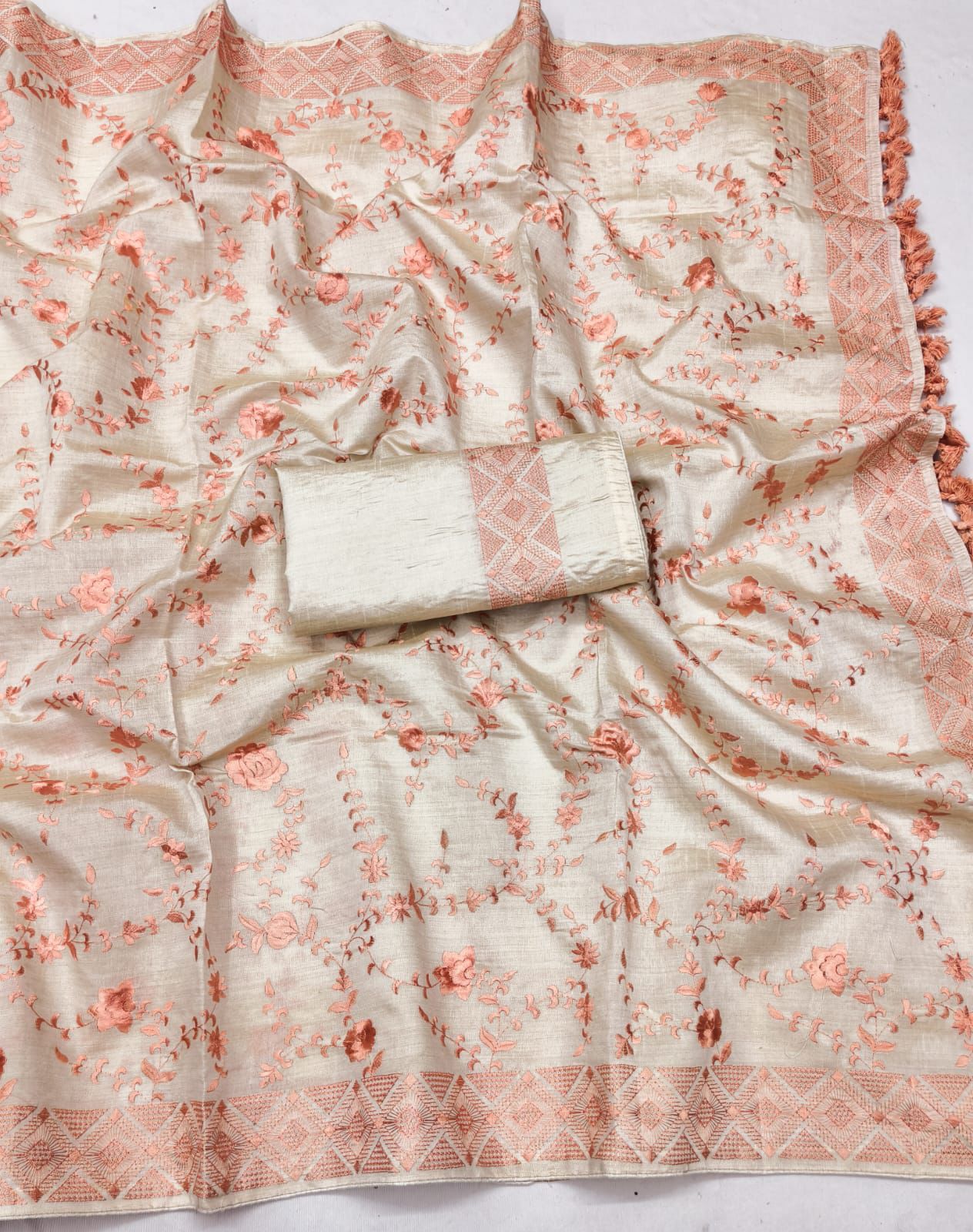 Enthralling Beige Embroidery Work Tussar Silk Saree With Proficient Blouse Piece