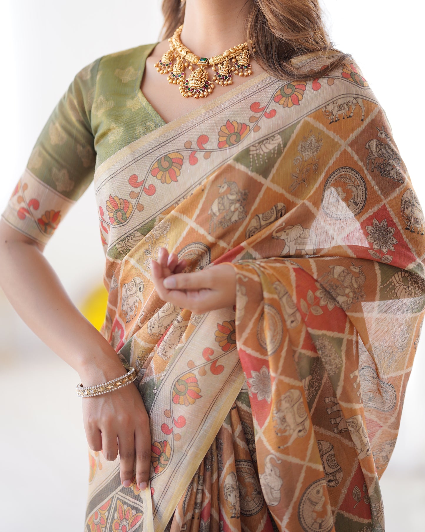 Heritage Kalamkari Inspired Earthy Beige Printed Saree with Floral Border & Artistic Pallu