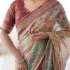 Classic Beige Linen Saree with Teal Green Heritage Border & Traditional Story Print Detailing | Premium Cultural & Festive Wear