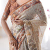 Elegant Sand Beige Linen Saree with Rust Brown Paisley Border & Heritage Animal Motif Prints | Premium Cultural & Festive Wear