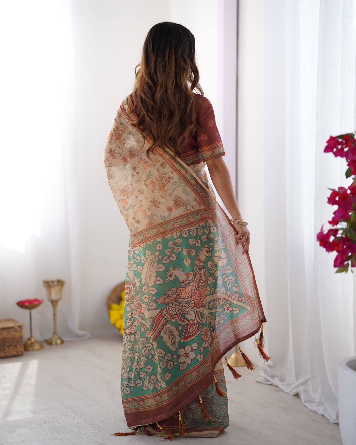 Classic Beige Linen Saree with Teal Green Heritage Border & Traditional Story Print Detailing | Premium Cultural & Festive Wear