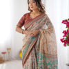 Classic Beige Linen Saree with Teal Green Heritage Border & Traditional Story Print Detailing | Premium Cultural & Festive Wear