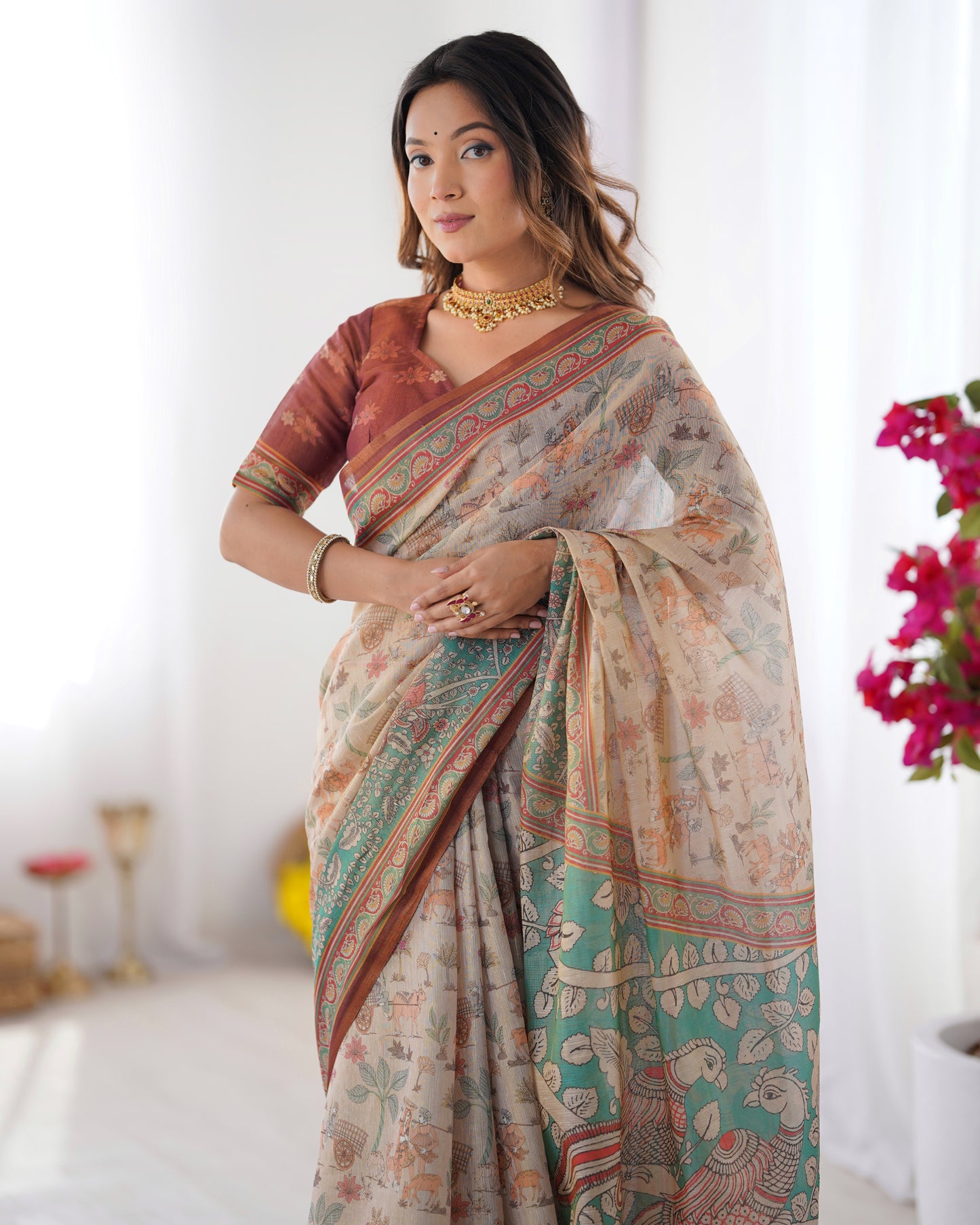 Classic Beige Linen Saree with Teal Green Heritage Border & Traditional Story Print Detailing | Premium Cultural & Festive Wear