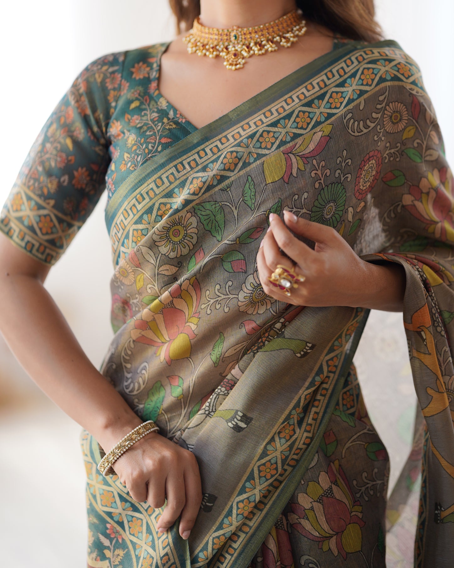 Earthy Olive Brown Linen Saree with Teal Green Heritage Border & Artistic Elephant Motif Prints | Premium Cultural & Festive Wear