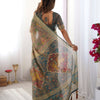 Earthy Olive Brown Linen Saree with Teal Green Heritage Border & Artistic Elephant Motif Prints | Premium Cultural & Festive Wear
