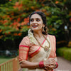 Cream and Peach Silk Saree with Pink Woven Border